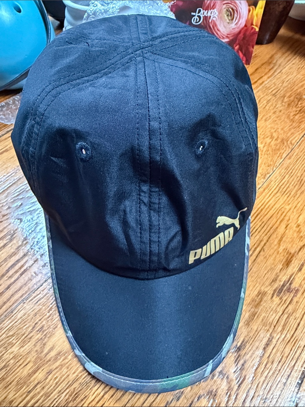 PUMA Way 1 black baseball cap with camo trim. SnapBack style. One Size.